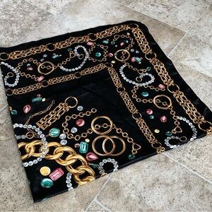 Brand new with tag on. Elegant Black and Gold Scarf
